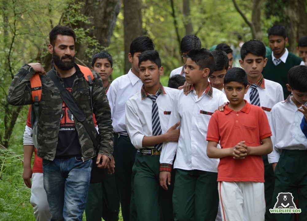 Shabir with a group of school children, last year, on one of their visits to the Dachigam Bear Rescue Centre! 