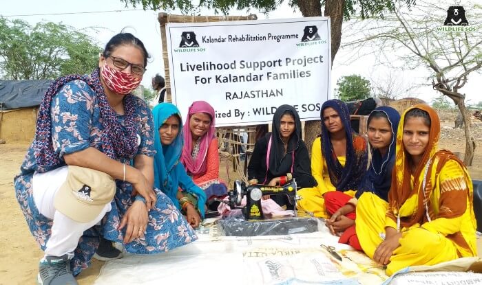 Ms. Rakhee Sharma with the women of the Kalandar community.